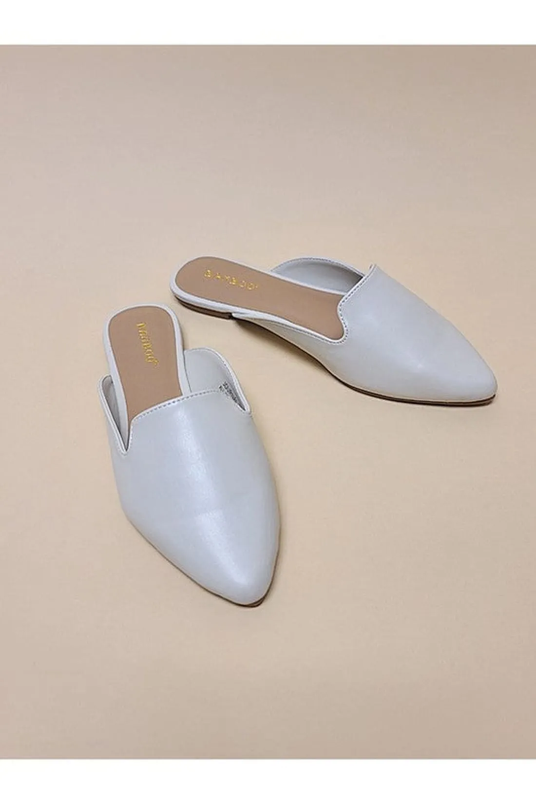 Flat Mules in Neutral Tones
