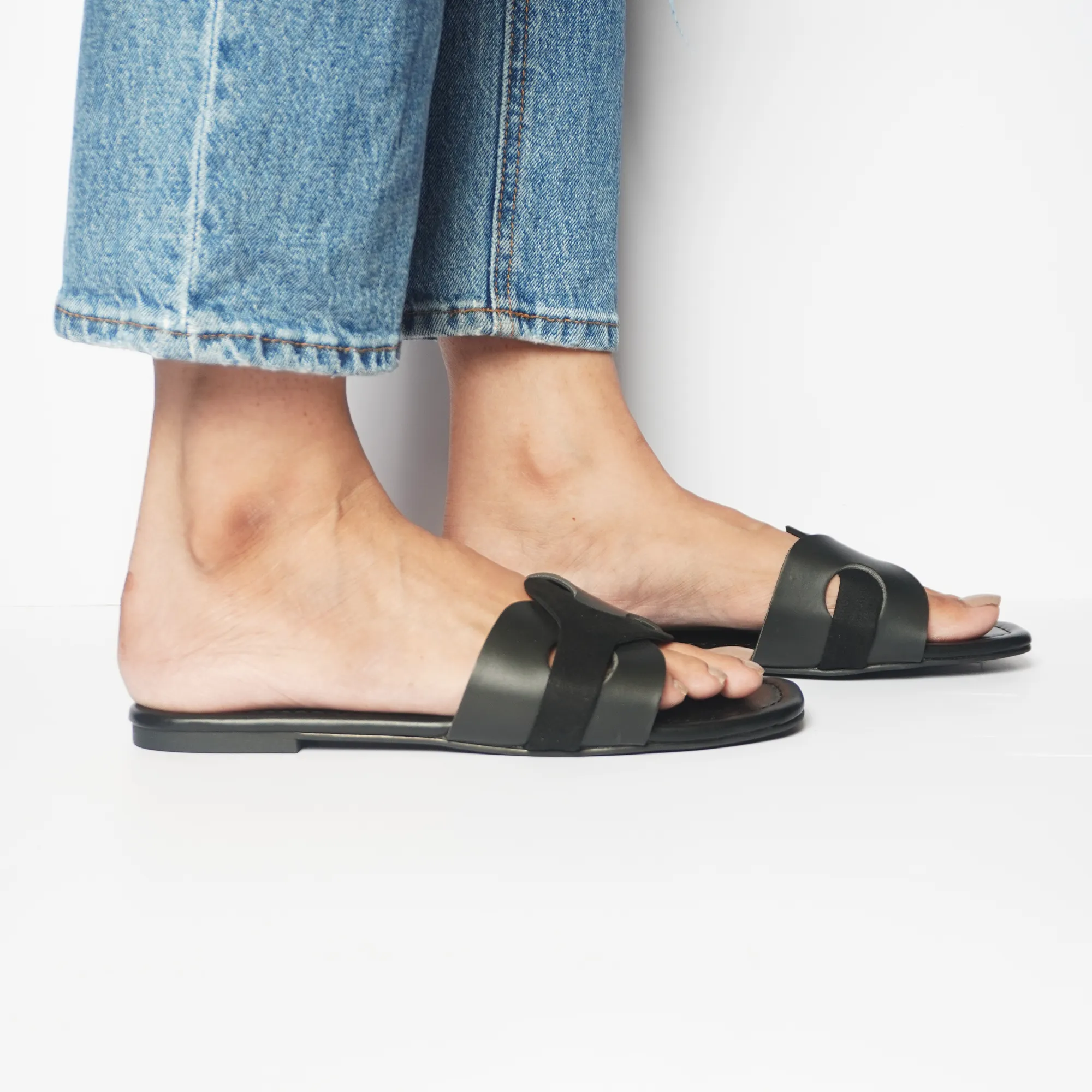Two Tone Interlocked Black Flats
